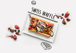 BELGIUM WAFFLE WITH FRUITS AND CHOCOLATE ON TOP ON TOP